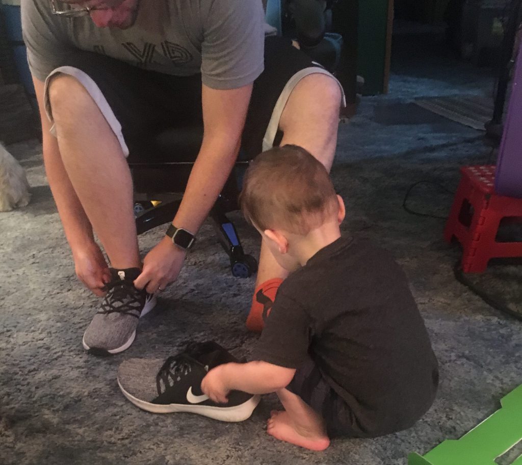 grandson helps dad with shoes  ~ Lifeofjoy.me