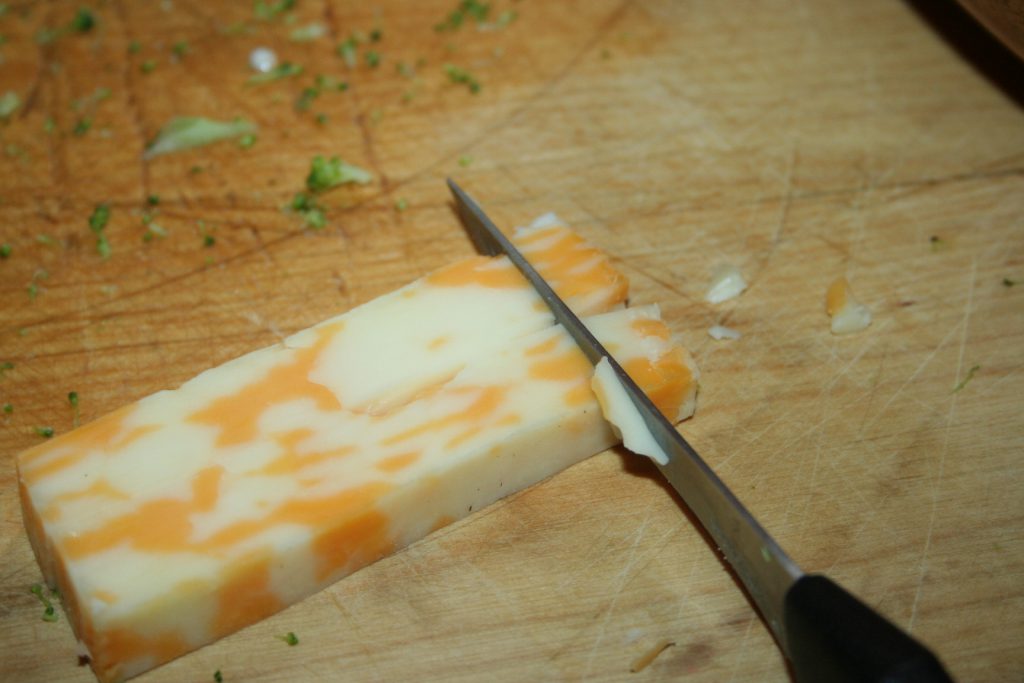 Cutting cheese into cubes ~ Lifeofjoy.me
